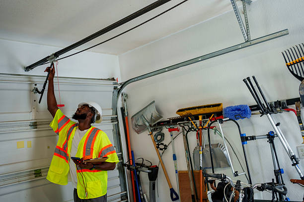 Professional Garage Door Panel Replacement technician working in Saegertown, PA